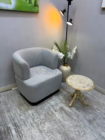 Light grey single armchair in good condition