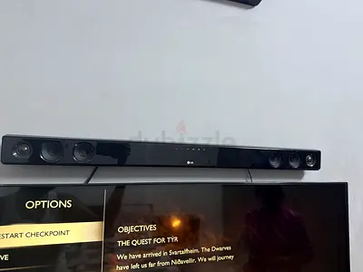 LG Soundbar with Wall Mount - Good Working Condition