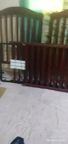 Solid wood baby crib — disassembled, good condition