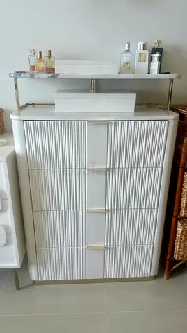 Pan Emirates High Gloss white vertical ribbed Chest of Drawers with gold trim and additional shelf