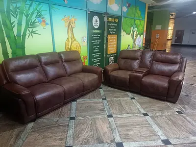 Electric leather recliner five seater for sale perfect working condition