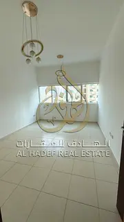 Al Majaz 3 2BR Balcony Free Parking and Maintenance