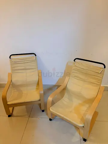 Two IKEA Poäng Armchairs - Light Wood Frame with Beige Covers, Very comfortable.