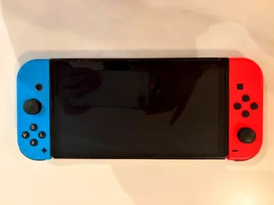 Nintendo Switch Console with Carrying Case + 2 Games (Zelda, Minecraft)