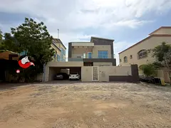 Spacious villa for sale in Al-Yasmeen | 5 bedrooms + majlis + 2 living rooms + balcony