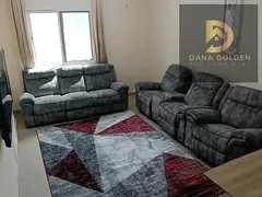 For monthly rent: two rooms, two bathrooms, and a balcony in Al Taawun, Sharjah.