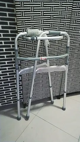Lightweight Adjustable Walker - Used for people with walking disabilities, brand new and once used
