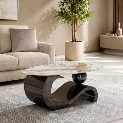 Modern sculptural coffee table with marble top
