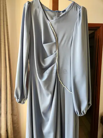 Light blue long-sleeve elegant dress with pearl trim, size L. Brand new