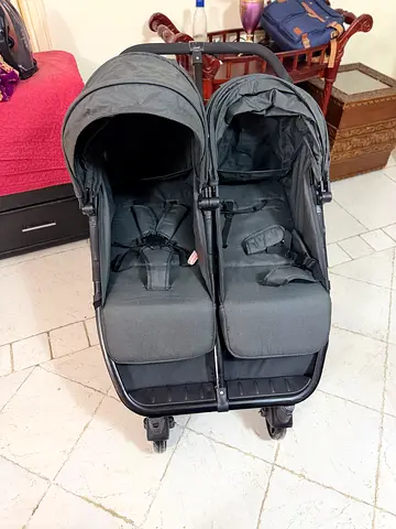 Double side-by-side stroller for twins - good condition