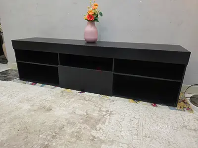 Low black TV unit / entertainment with open shelves
