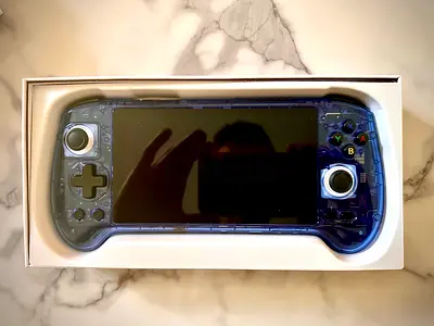 Anbernic RG556 Portable Gaming Console - Transparent Blue (Like New)