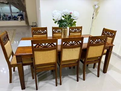 Solid Wood 8-Seater Dining Table with Upholstered Chairs - Good Condition