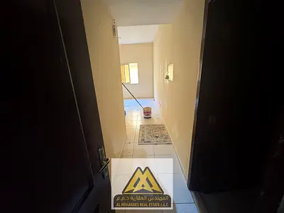 Spacious studio in Nuaimiya 1, Ajman, central AC, near all services. AED 16K/year, 4 or 6 payments, uncashed security cheque.