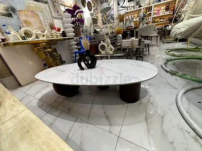 White Marble-Effect Oval Coffee Table with Dark Cylinder Legs