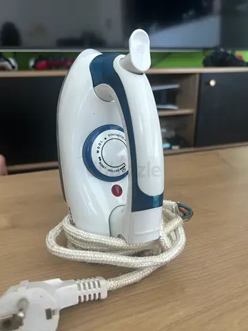Traveling light iron