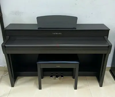 The Yamaha Clavinova CLP-735DW (Dark Walnut)