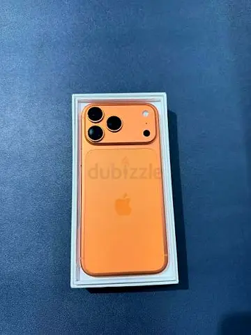 Apple iPhone (orange) in original box — good condition