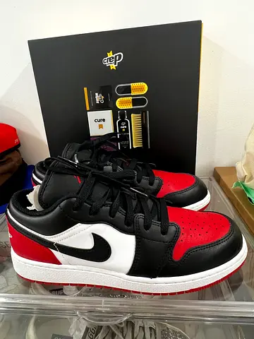 Pair of red, white and black low-top sneakers (clean, good condition) Nike