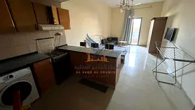 Furnished studio for annual rent, featuring a private parking space and a balcony; located next to A