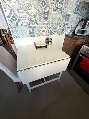 White drop-leaf kitchen table with storage — compact dining table pick up only