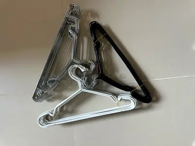 45 pieces of Plastic and metal Clothes Hangers - White, Black, Grey (18 pcs)