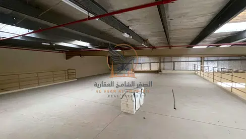 Huge commercial warehouse for annual rent with a spacious mezzanine modern fire system flexible payments wide side street and ready now