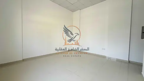 For annual rent in Ajman first occupancy, one bedroom and living room in a new building in Al Rashidiya 2 Central air conditioning two bathrooms