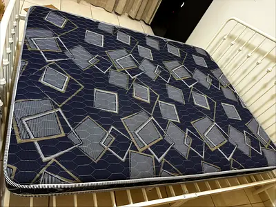Used Double Mattress in Good Condition - Foam/Coil, Navy Geometric Cover