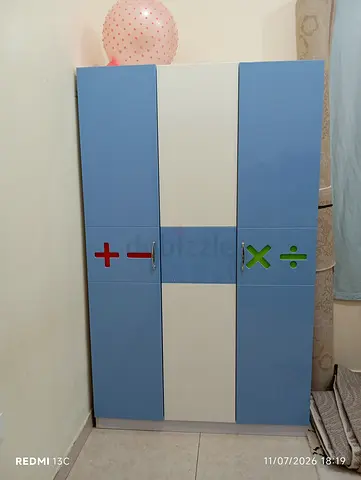 Blue and white children's wardrobe with math symbol decals - good condition