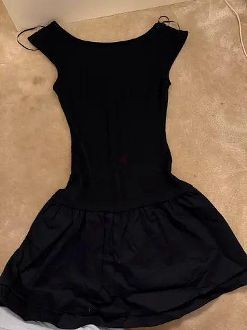 Black short sleeve skater dress, size likely S/M — good condition