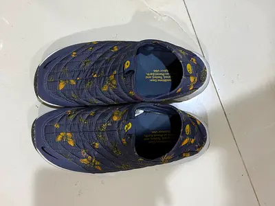Nike Men's slip-on casual shoes, quilted design, size unknown - gently used
