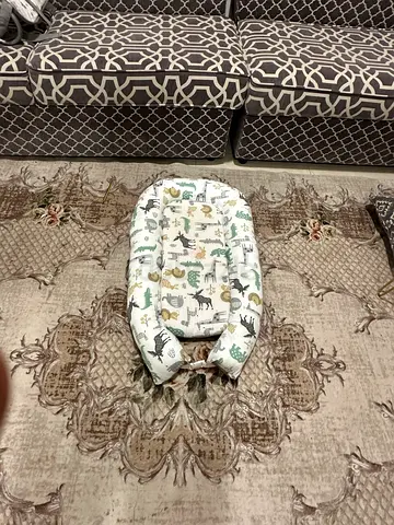 Reversible Baby Nest Lounger / Portable Co-Sleeper (Animal Print) – AED 50