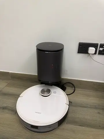 Robot Vacuum with Auto-Empty Dock — Good Condition