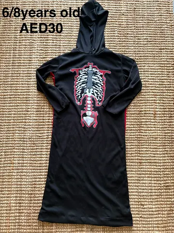Kids black skeleton hooded costume dress - age 6/8, AED 30
