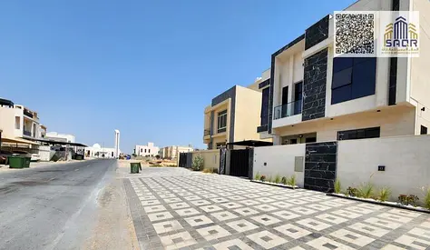 A luxurious villa featuring a garden and a waterfall; finished to a super-deluxe standard with stone and marble.