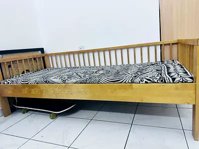 Single wooden daybed with slatted back and mattress. Along with green color canopy Size 170X80 CM