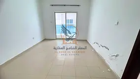 Premium 2BR apartment for annual rent with central AC 2 baths balcony inside parking spacious layout