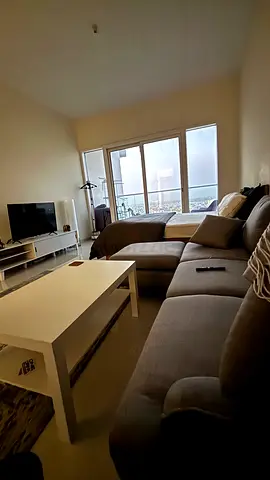 Comfortable L-shaped sofa set with coffee table - good condition