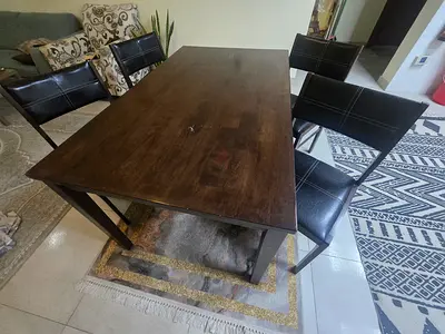 Solid Wood Dining Table with 4 Black Leather Chairs - Used