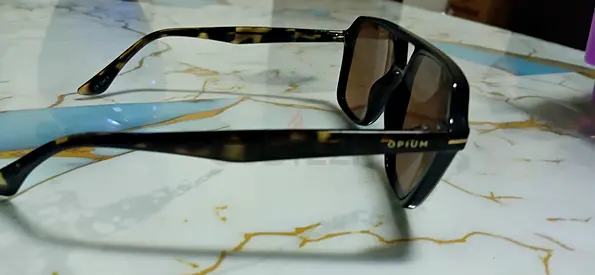 Opium tortoiseshell sunglasses — gently used price can be negotiated