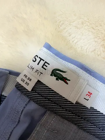 Lacoste men's slim fit trousers - size US 30 / FR 38. I’m 176cm and they fit perfectly. 32cm waist.