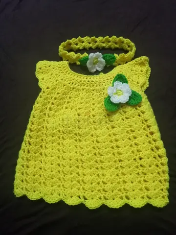 Handmade yellow crochet baby dress with matching headband (0-6 months approx.)