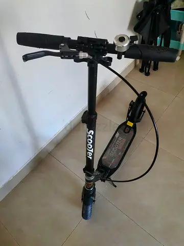 Used black manuel scooter — good condition, ready to ride