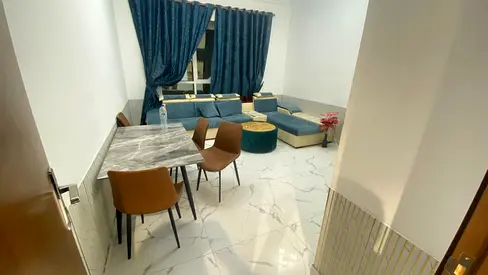Furnished One-bedroom apartment | For monthly rent | Ajman - Al Rashidiya - Oasis Towers | Includes bills and internet - Gym - Swimming pool - Parking