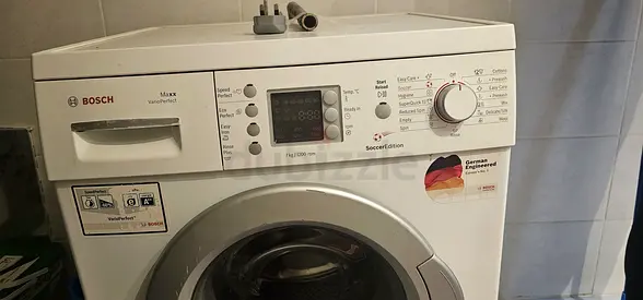 Bosch front-load washing machine (used) - 7kg, White