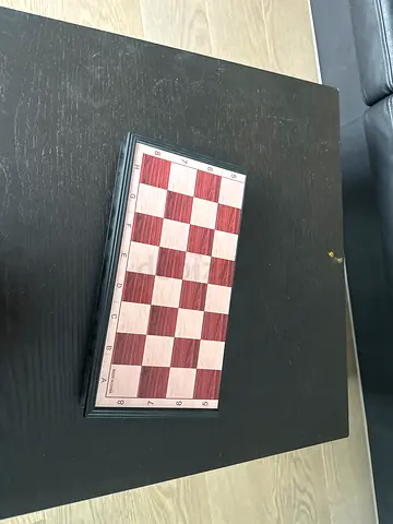 Foldable magnetic plastic travel chess board