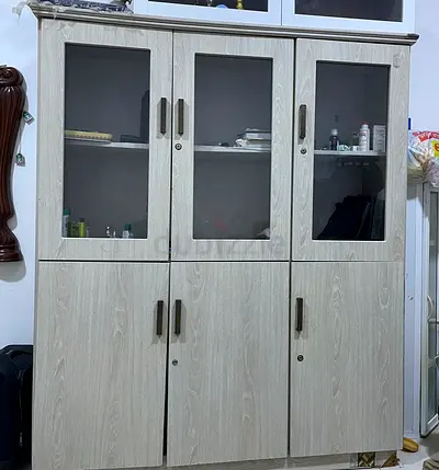 ‏cupboard cum book shelves