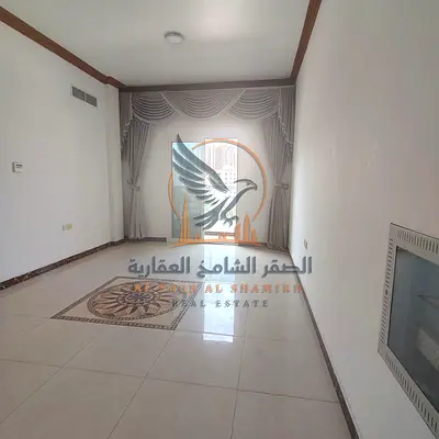 غرفة وصالة  مع بلكون وتكييف مركزي للإيجار في الراشدية 3 عجمان خلف جراند مول