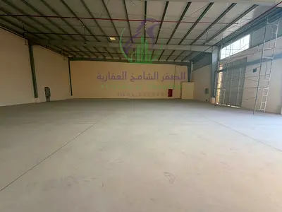 Brand new 6,330 sq ft. warehouse in Al Sajaa, two gates, bathroom, 36 kW, fire system, Civil Defence, main road and easy truck access.